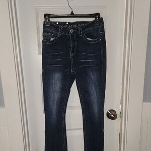 Blue Boot Cut Jeans with Distressed Details